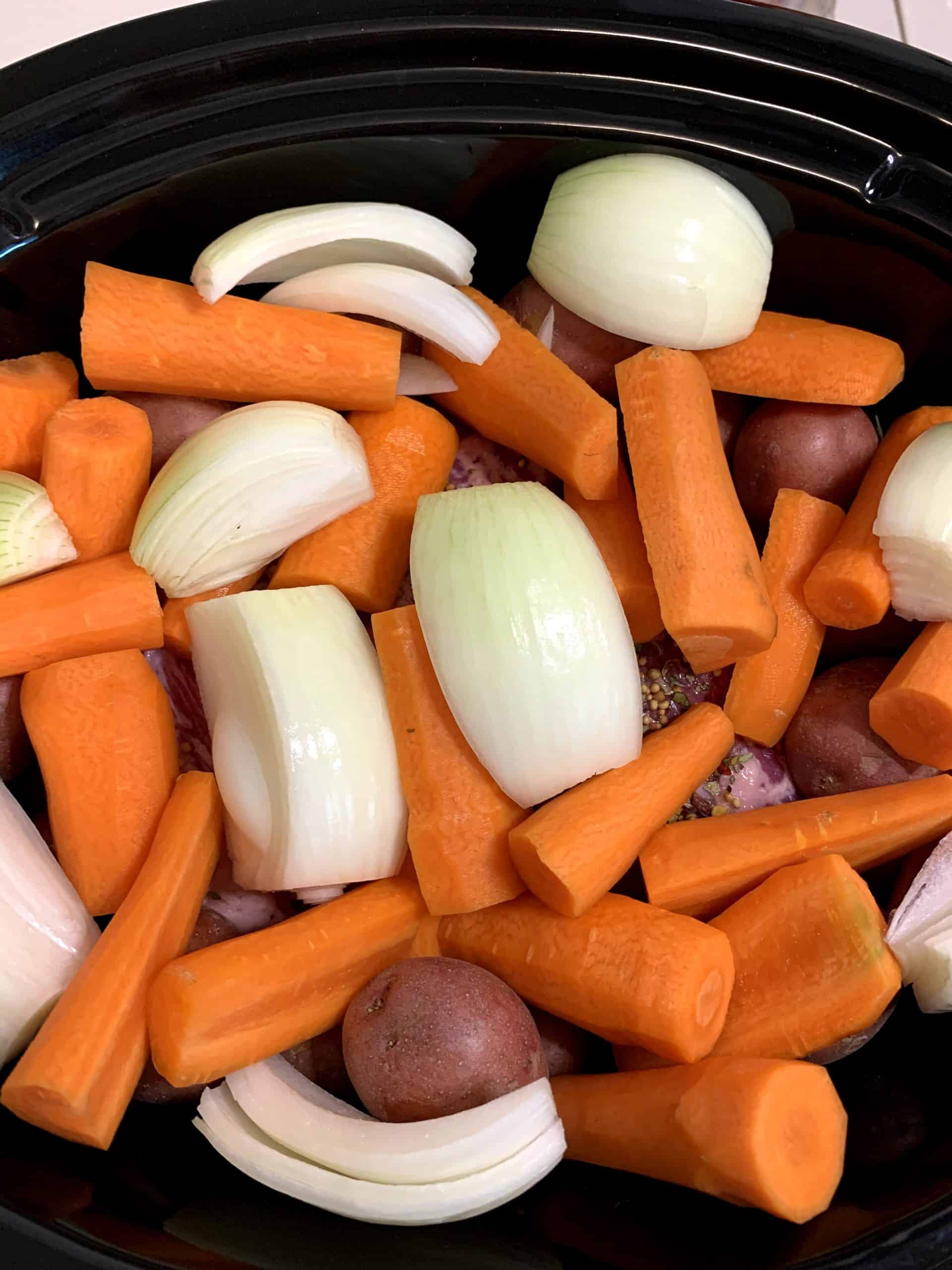slow cookercorned beef with carrots, potatoes, and onions